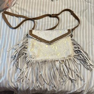 Myra cross body cow hyde purse with fringe